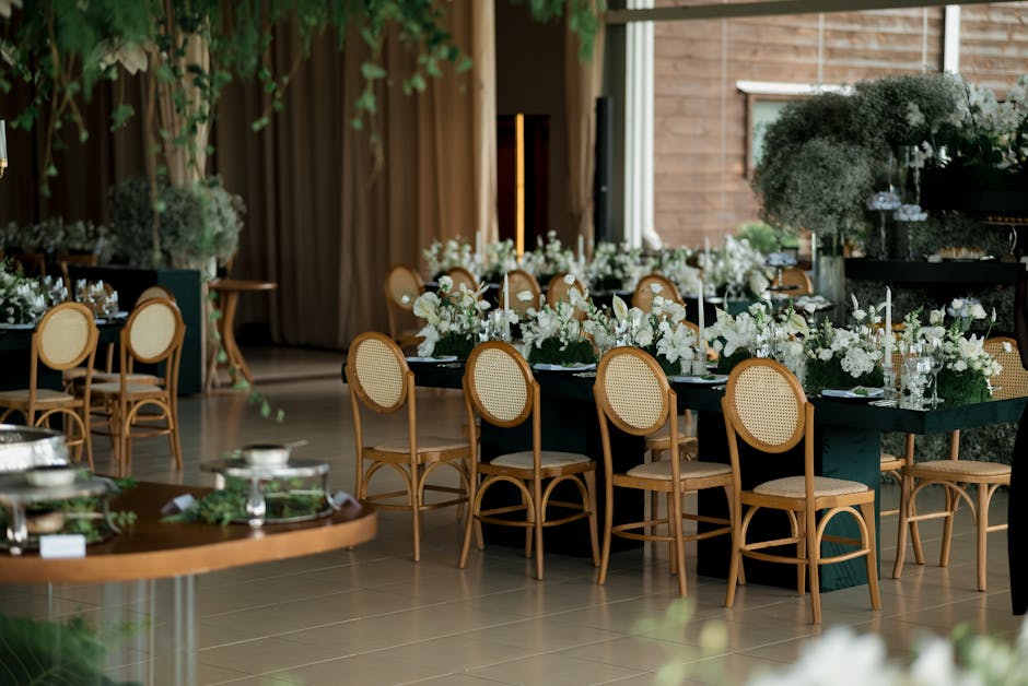 Beautifully set wedding reception table with elegant centerpieces